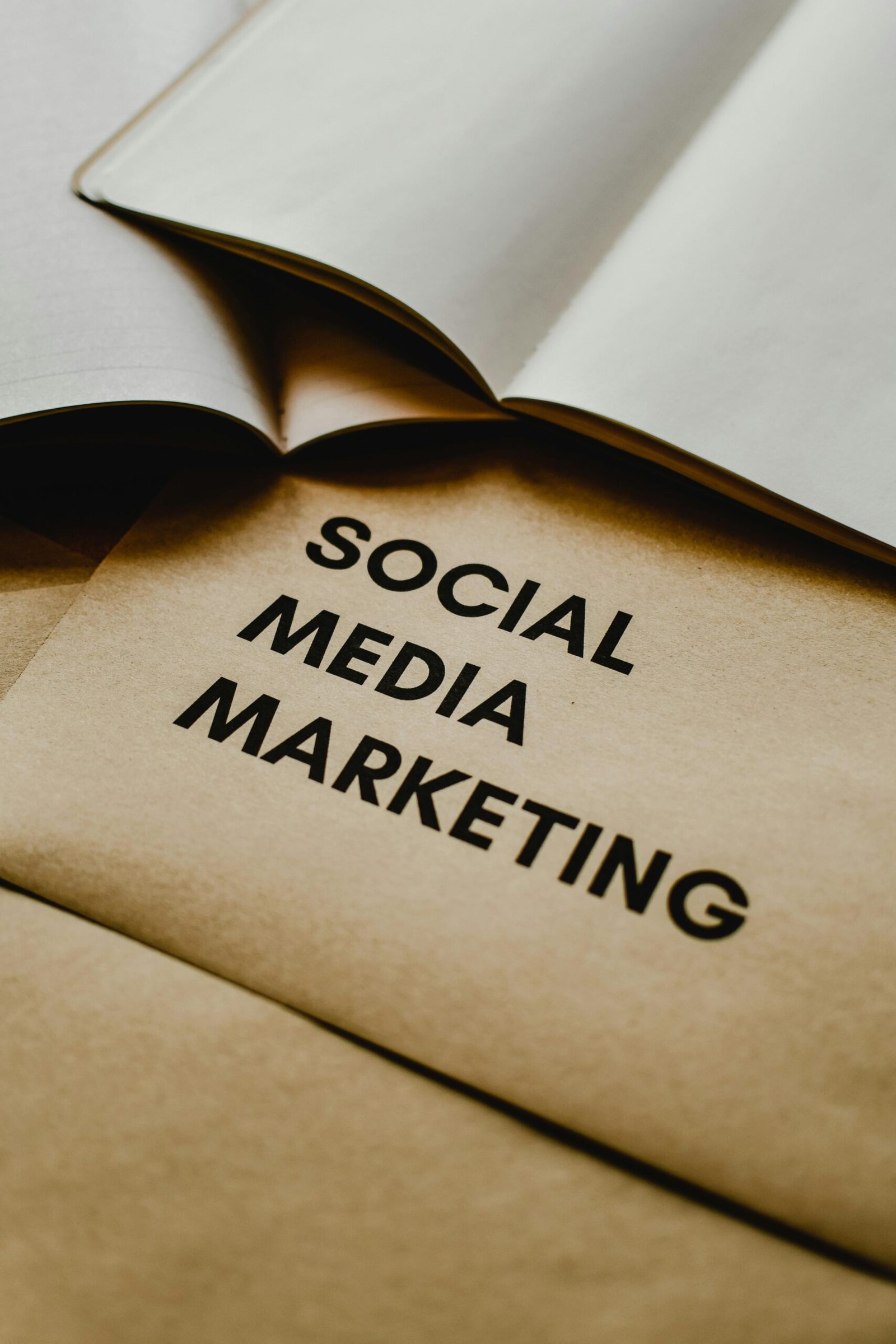 pexels-photo-6956226-6956226 Close-up of brown envelopes with 'Social Media Marketing' text, ideal for startup themes.